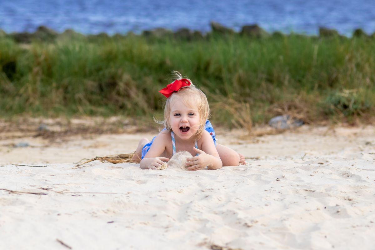 little girl in sand