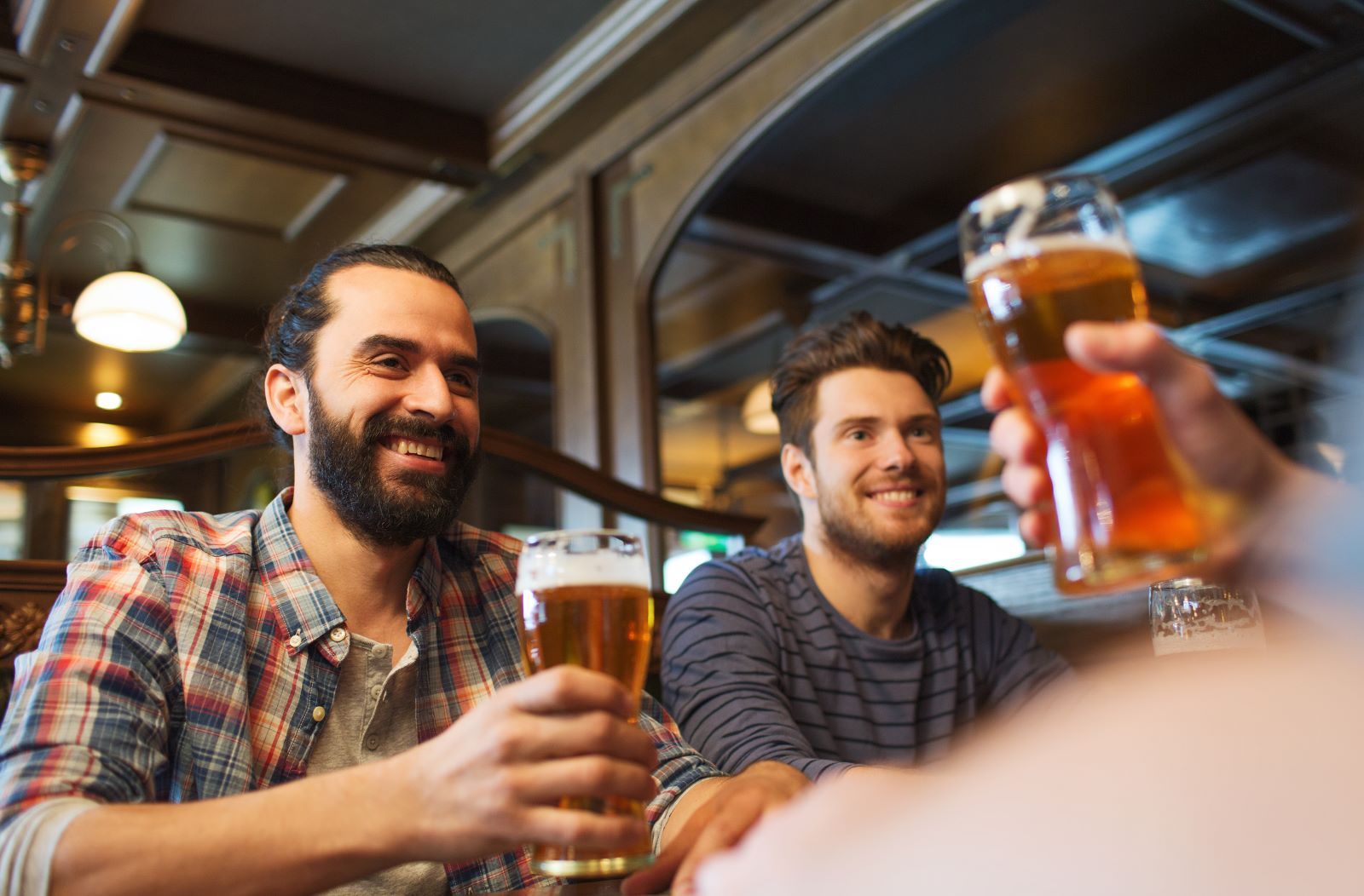 men enjoying beer