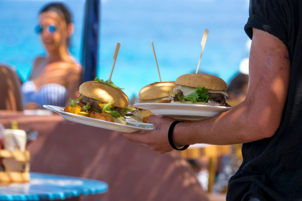 Burgers being served at the beach