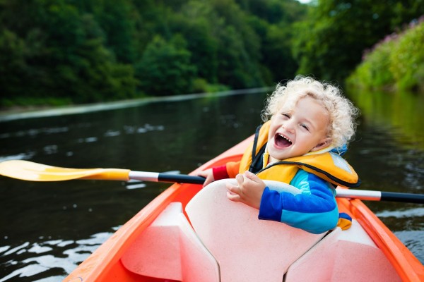 child kayaking