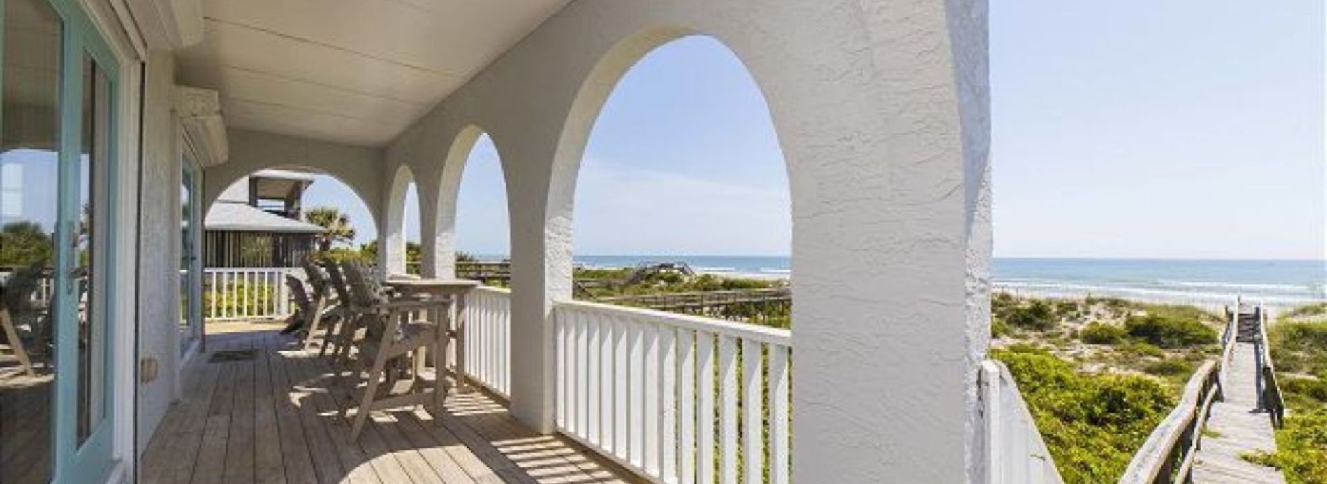 Beachfront Hideaway wraparound porch overlooking ocean